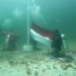 Pengibaran bendera merah putih di bawah laut Pulau Labun